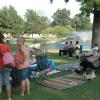 A crowd gathers in Janssen Park for a free concert.